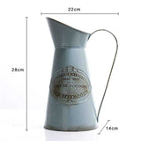 Broc vintage en métal