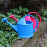 Arrosoir coloré | L'arroseur arrosé