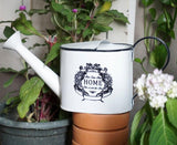 arrosoir blanc en fer