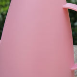 Watering Can with Apple