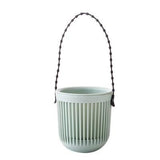 pot suspendu avec réservoir d'eau