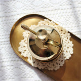 vaporisateur en laiton doré