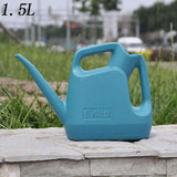 Arrosoir en plastique pour le jardin 