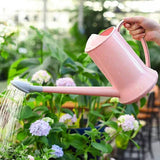 arrosoir en plastique rose