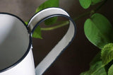 Tin watering can